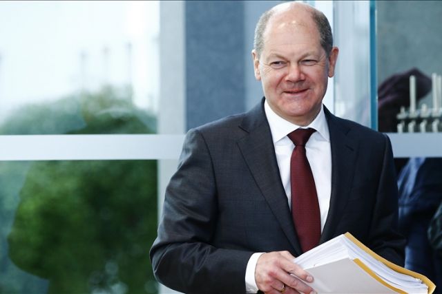 Frontrunner to replace Merkel spells out conditions for German coalition government