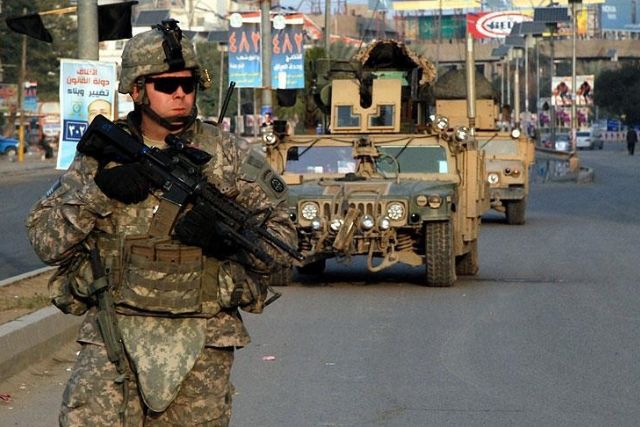 US combat forces begin withdrawing from Iraq
