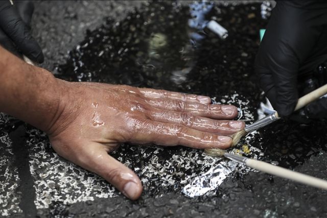 Climate activists glue themselves to roads in Berlin, Munich