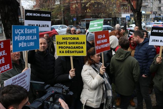 Kosovo protesters use flares, tear gas against a war crimes court official