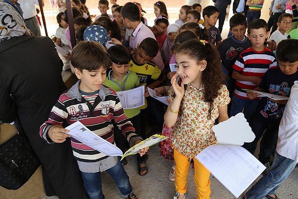 Hatay'daki Suriyeli çocukların karne heyecanı