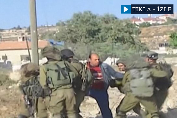 Savunmasız Filistinliye İsrail askerlerinden tekme