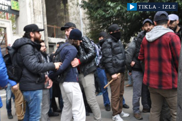 Eylemcilerin arasına dalıp tek başına dağıtan genç