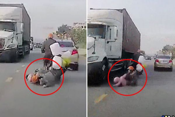 Motosikletten düşen anne ve bebeği TIR'ın altında kalmaktan son anda kurtuldu