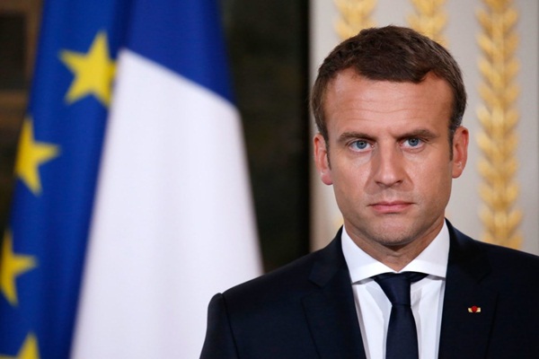 Macron, ABD'nin Suriye'de asker bırakmasından memnun