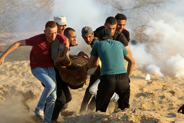 İsrail askerleri Filistinlilere ateş açtı: 1 şehit, 55 yaralı
