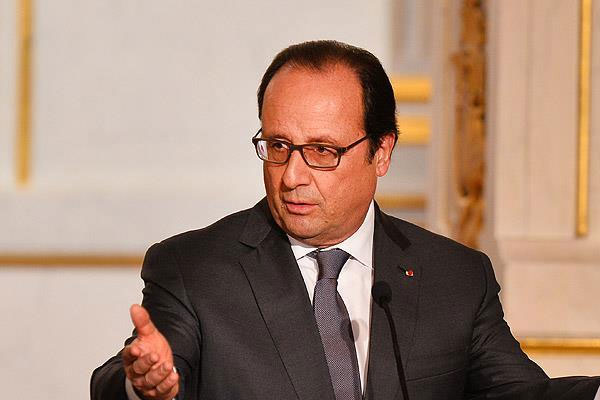 Hollande: Esed halkını katliamdan geçiriyor