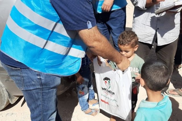 İmkander'den Suriyeli yetimlere kışlık yardımı