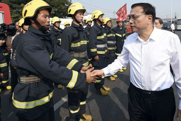 Çin 2016 büyüme hedefini düşürdü