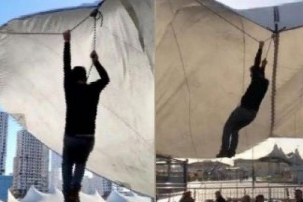 Pazar çadırı uçmasın diye tuttu ama kendisi uçtu