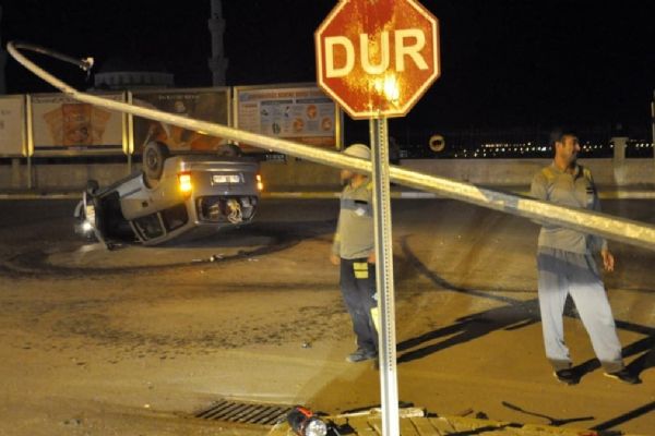 40 metre savrulup takla atan otomobilden yara almadan kurtuldu