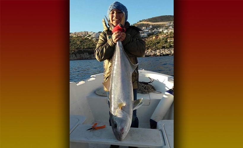 12 yaşındaki Levent, boyu büyüklüğünde balık yakaladı