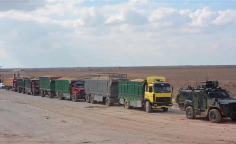 Barış Pınarı Harekatı'yla PKK/YPG'den kurtarılan köyün silolarındaki tahıl bölge halkına dağıtılıyor