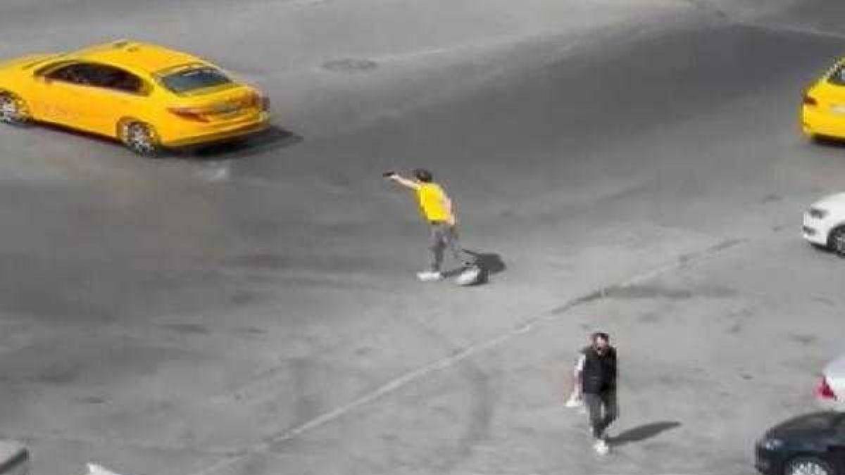 Tartıştığı taksicinin arkasından böyle ateş etti