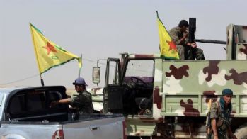 Alman haber sitesi YPG'nin iç yüzünü anlattı