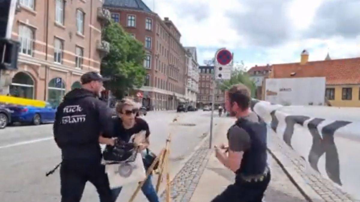 Polis korumasında Kur'an'a saldırıyı engellemek isteyen kadın hırsızlıkla suçlandı