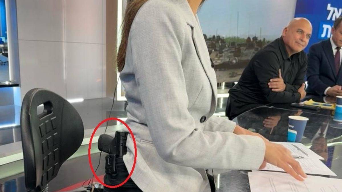 Yahudi spiker canlı yayına silahla çıktı