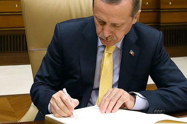 Erdoğan'dan 9 kanuna onay