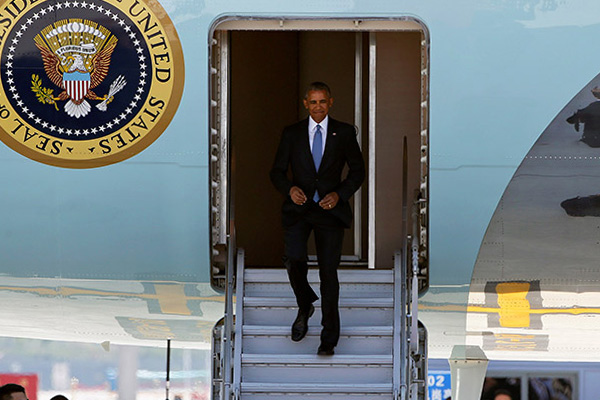 Obama'ya Çin’de düşük profilli karşılama