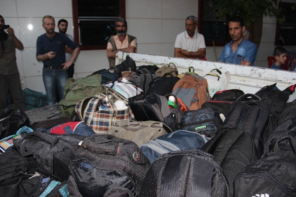 Ölenlerin çantaları ailelere gönderiliyor