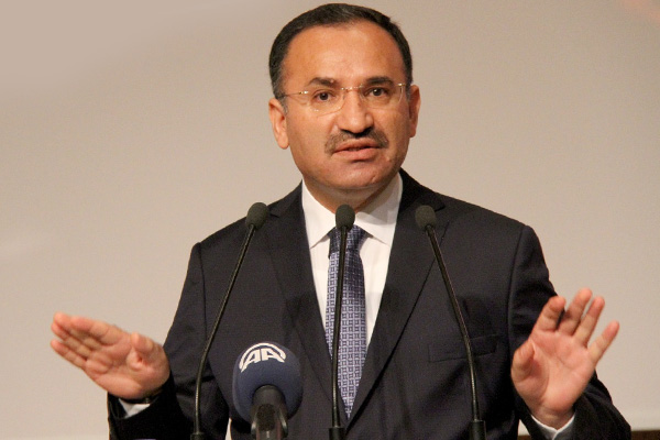 Bozdağ: Adil Öksüz Türkiye'de saklanıyor