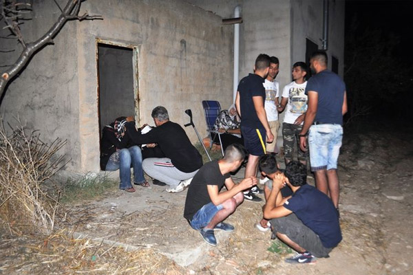 Suriyelileri bekçi kurtardı