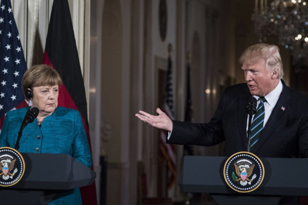 Trump, görüşme sonrası Merkel'e Twitter'dan seslendi: Borçlarını öde!