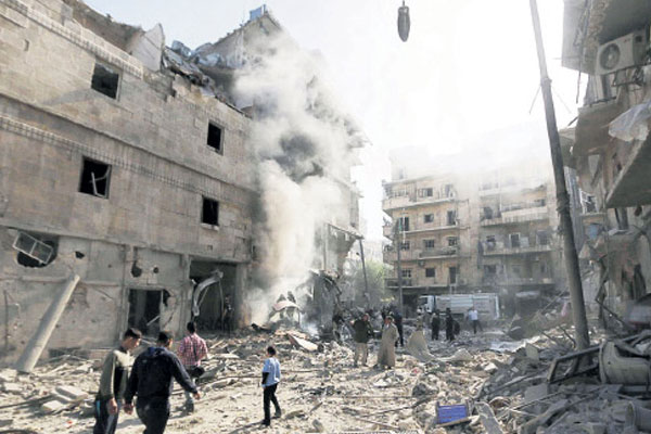 Baas rejiminden Halep'e hava saldırısı