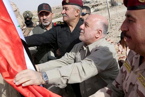 İbadi, Husaybe Sınır Kapısı'na Irak bayrağı astı