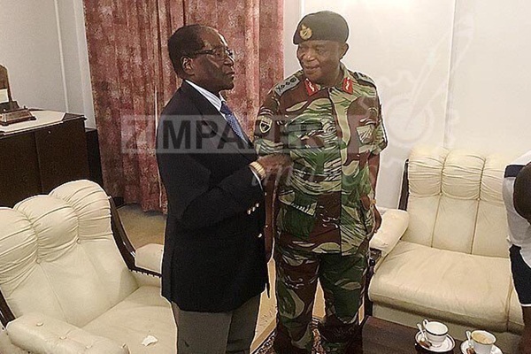 Darbenin ardından Mugabe'nin ilk fotoğrafları