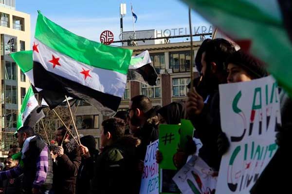 Amsterdam'da 'Doğu Guta'da bombaları durdur' gösterisi