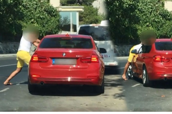 Tartıştığı eşi otomobilin kapılarını kilitleyince az daha canından oluyordu