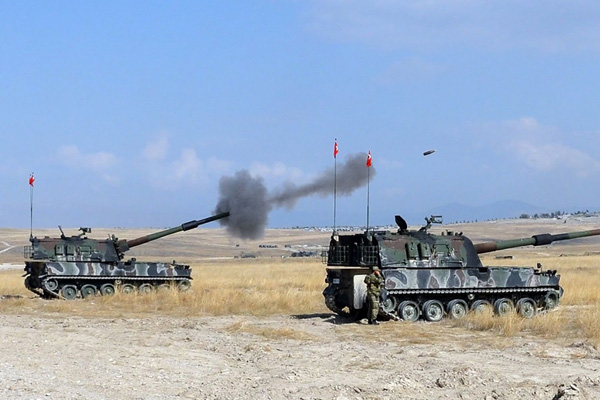 “Fırat’ın doğusuna top atışları ABD’ye dostça mesaj”