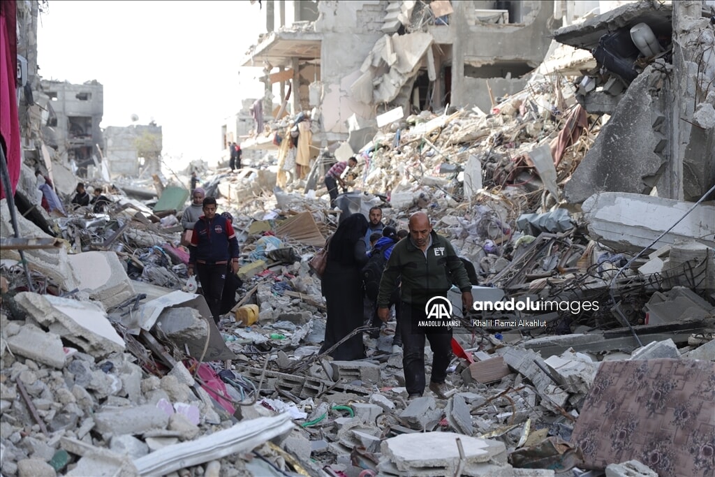 Gazze'nin kuzeyindeki Beyt Lahya'ya Filistinlilerin evlerine dönüşü sürüyor. - 3