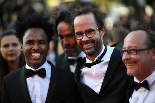 'Kahraman' çiftçi kırmızı halıda mültecilerle birlikte yürüdü - 0