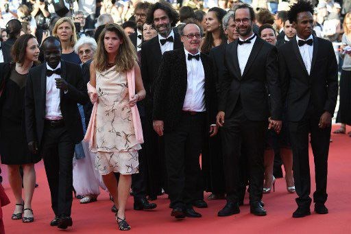 'Kahraman' çiftçi kırmızı halıda mültecilerle birlikte yürüdü - 0