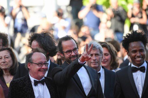 'Kahraman' çiftçi kırmızı halıda mültecilerle birlikte yürüdü - 0