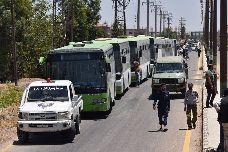 İsyanın başkenti Dera'ya Esed bayrağı çekildi! - 0