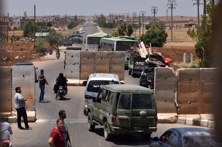 İsyanın başkenti Dera'ya Esed bayrağı çekildi! - 0